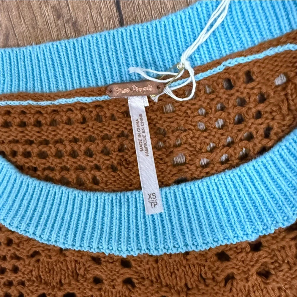 FREE PEOPLE brown and blue lined‎ crop sweater